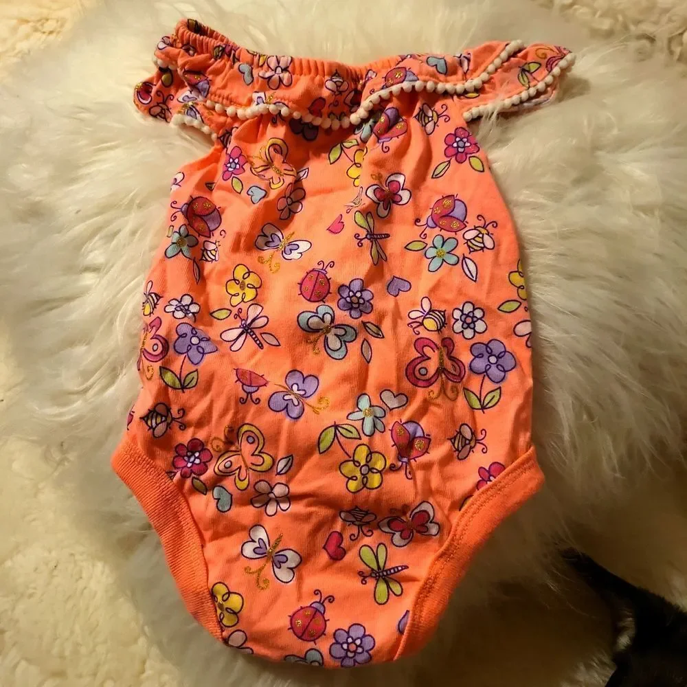 A garanimals onsie size 0-3months
